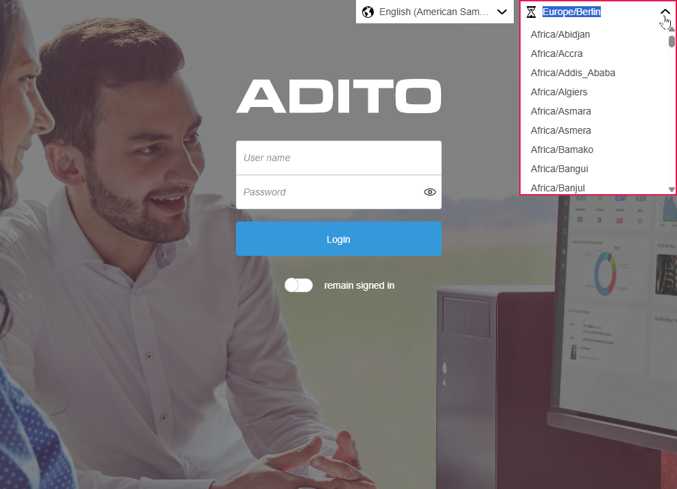 Login screen; top right dropdown for timezone selection ("Europe/Berlin") next to the field for the language